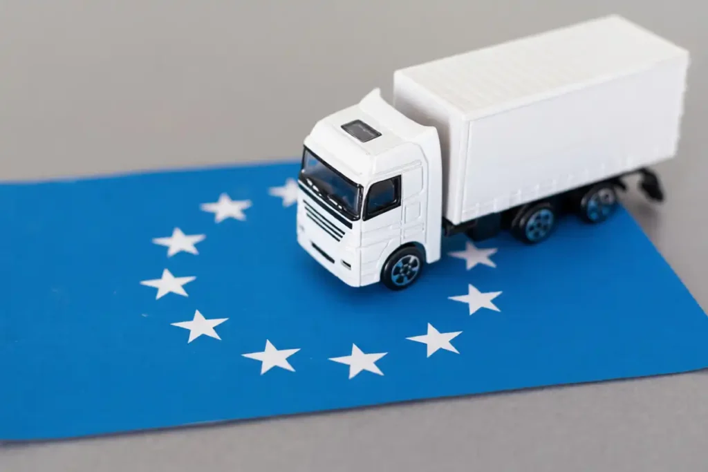 Camión en 3D sobre la bandera de la UE